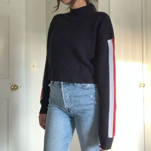 Navy knit cropped sweater with strip side detail!